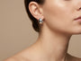 10407 - WG Chunky Huggie Hoop Earrings model still