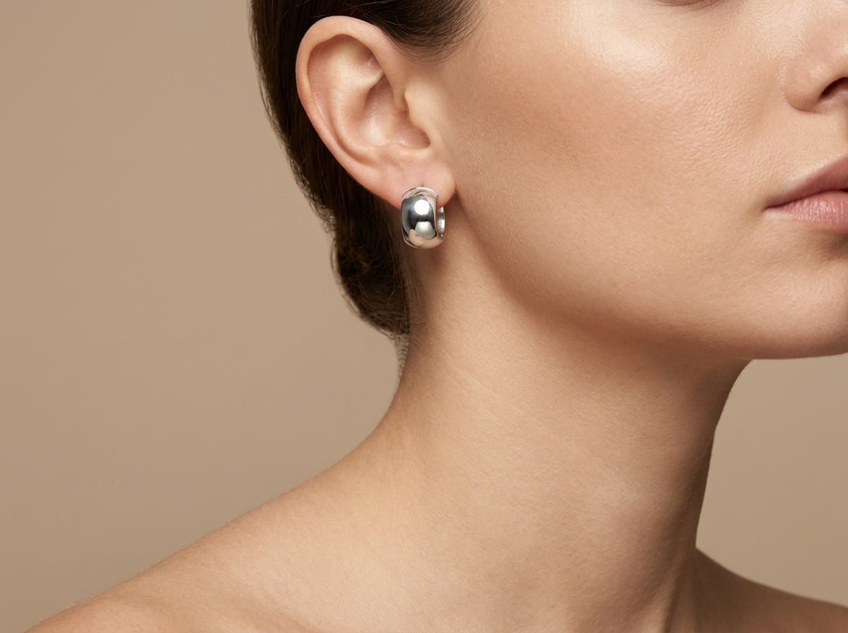 10407 - WG Chunky Huggie Hoop Earrings model still