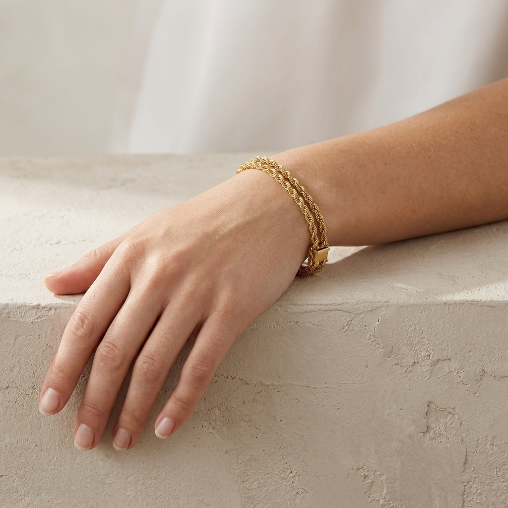 14K Gold Double Strand Rope Chain Bracelet model still