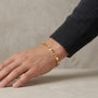 14K Figaro Chain Bracelet model still