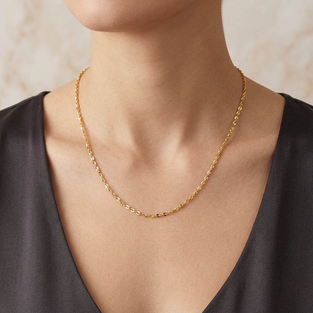 14K Yellow Gold Dainty Twisted Mirror Chain Necklace model still