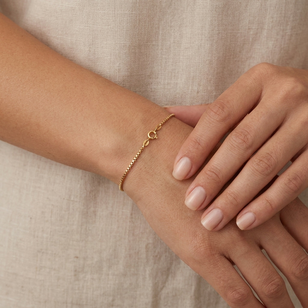 14K Yellow Gold Dainty Box Chain Bracelet model still