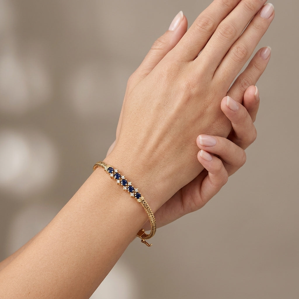 14K Yellow Gold Blue Sapphire & Diamond Bar Bracelet model still