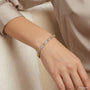 10K Two Tone Gold X & Diamond Link Bracelet model still