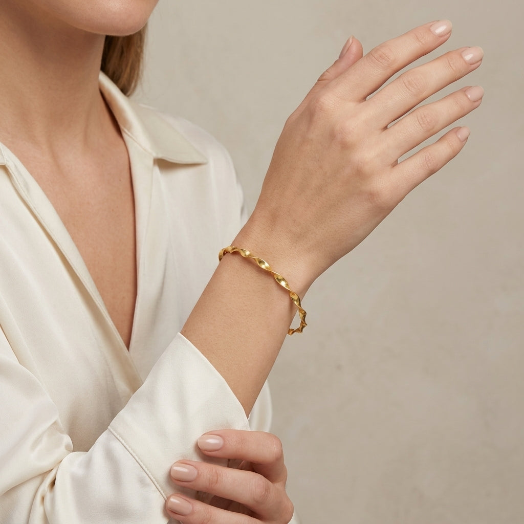 10371 - 9K Twist Bangle Bracelet model still