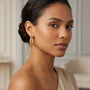 14K Yellow Gold Twisted Hoop Earrings model still
