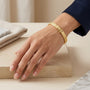 10175 - 14K YG Diamond Cut Textured Wide Omega Style Bracelet model still