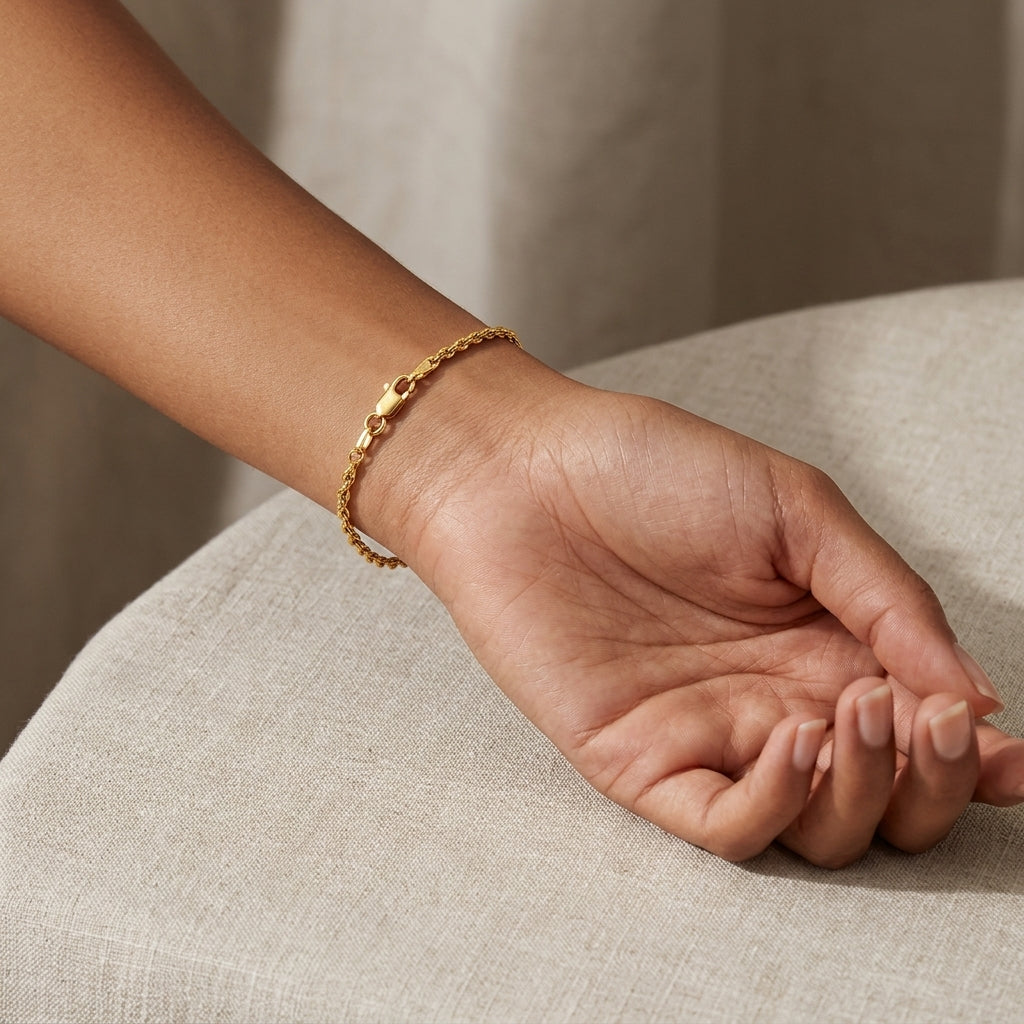 14K Gold Dainty Rope Chain Bracelet model still
