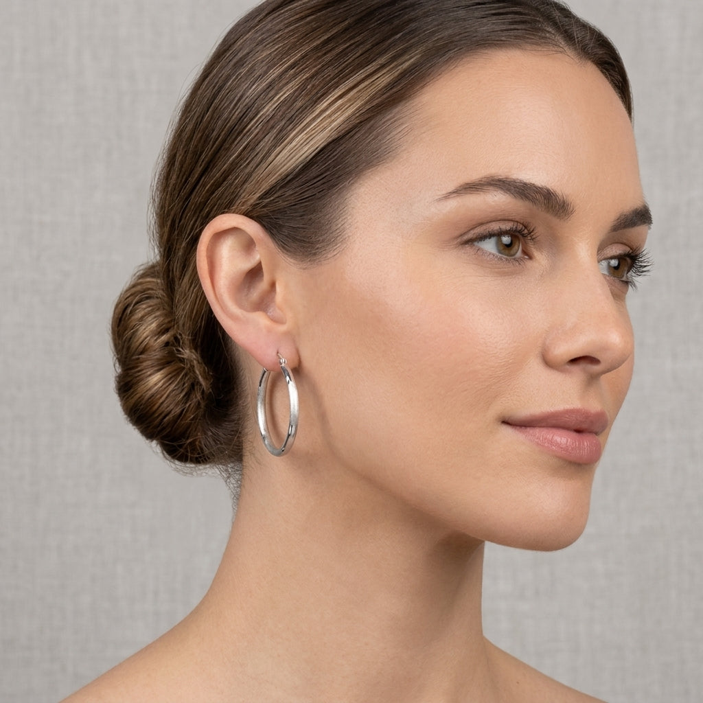 10K White Gold Textured Hoop Earrings model still