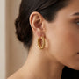 14K Yellow Gold Byzantine Chunky Hoop Earrings model still
