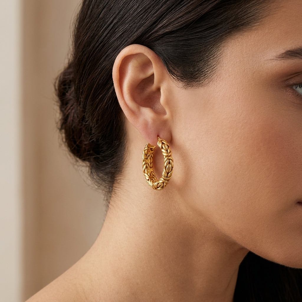 14K Yellow Gold Byzantine Chunky Hoop Earrings model still