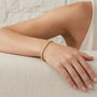 14K Yellow Gold Diamond Cut Circle Link Bracelet model still