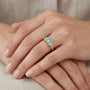 10K Yellow Gold Sky Blue Topaz Three Stone Ring model still