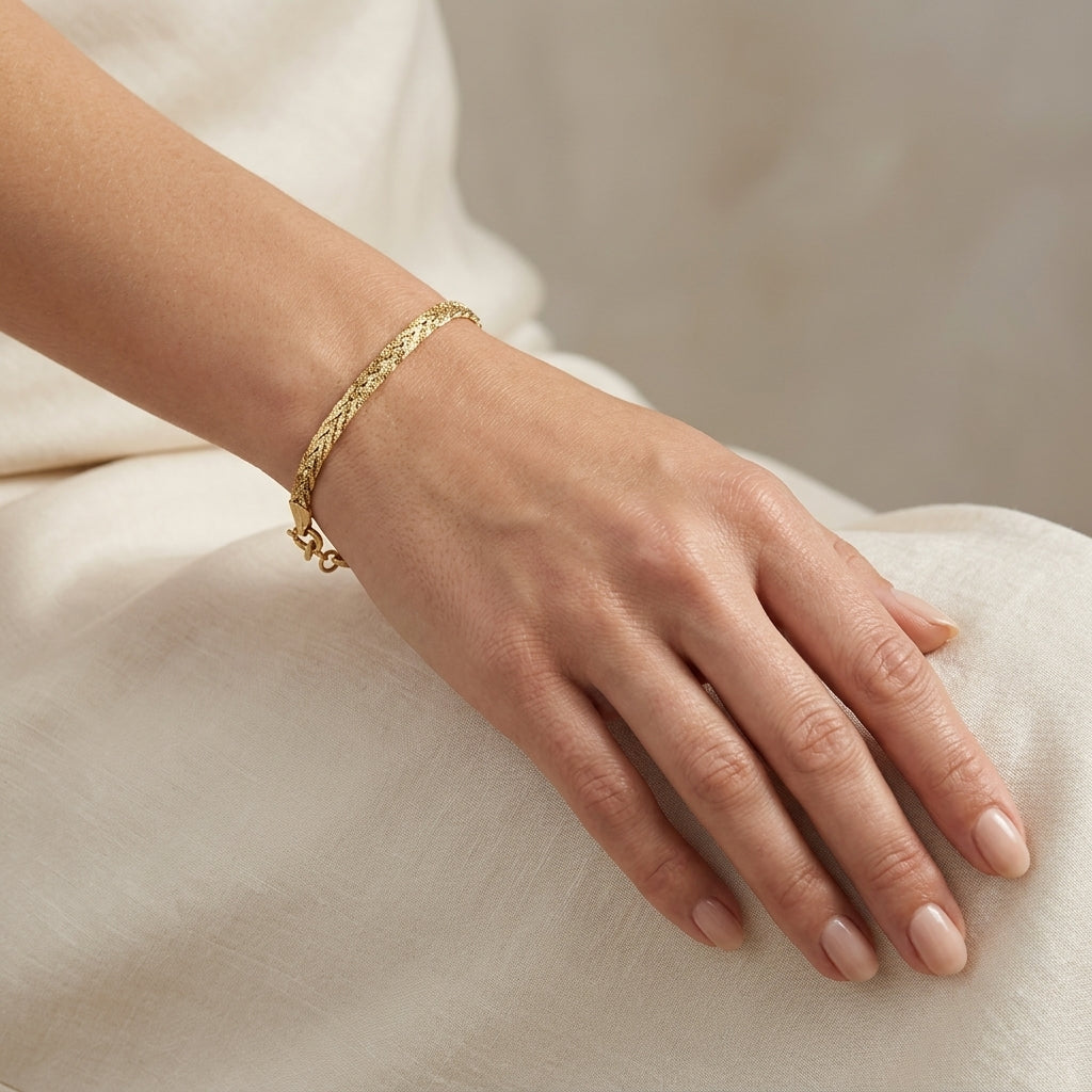 1042 - YG Woven Braided S Link Bracelet model still