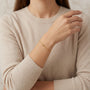 14K Gold Dainty Twisted Serpentine Link Bracelet model still