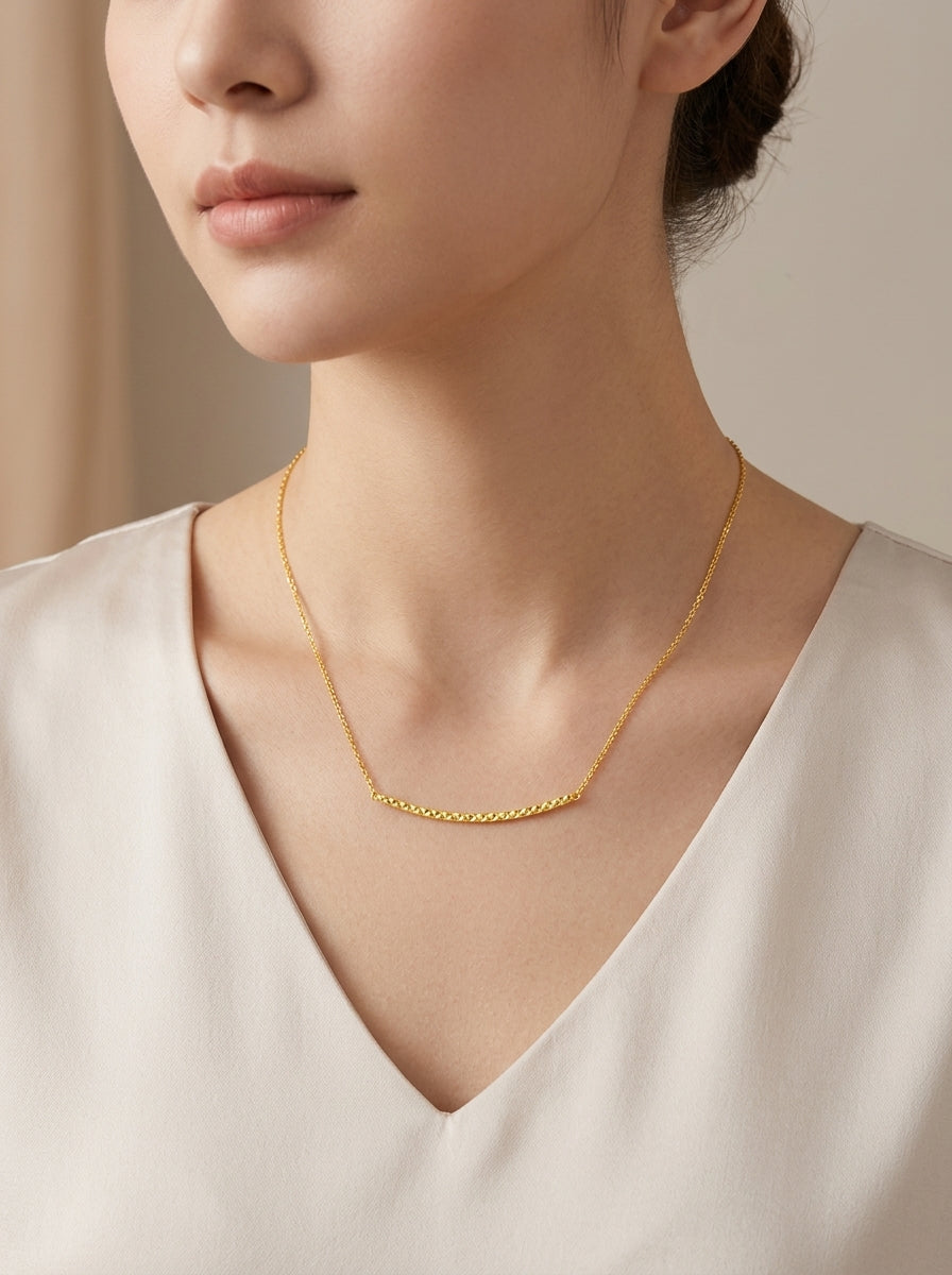 14K Yellow Gold Diamond Cut Bar Pendant Necklace model still