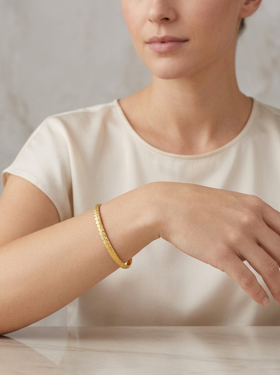 10273 - 10K Textured Diamond Cut Geometric Pattern Bangle Bracelet model still