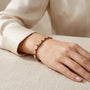 14K Yellow Gold Diamond & Garnet Tennis Bracelet model still