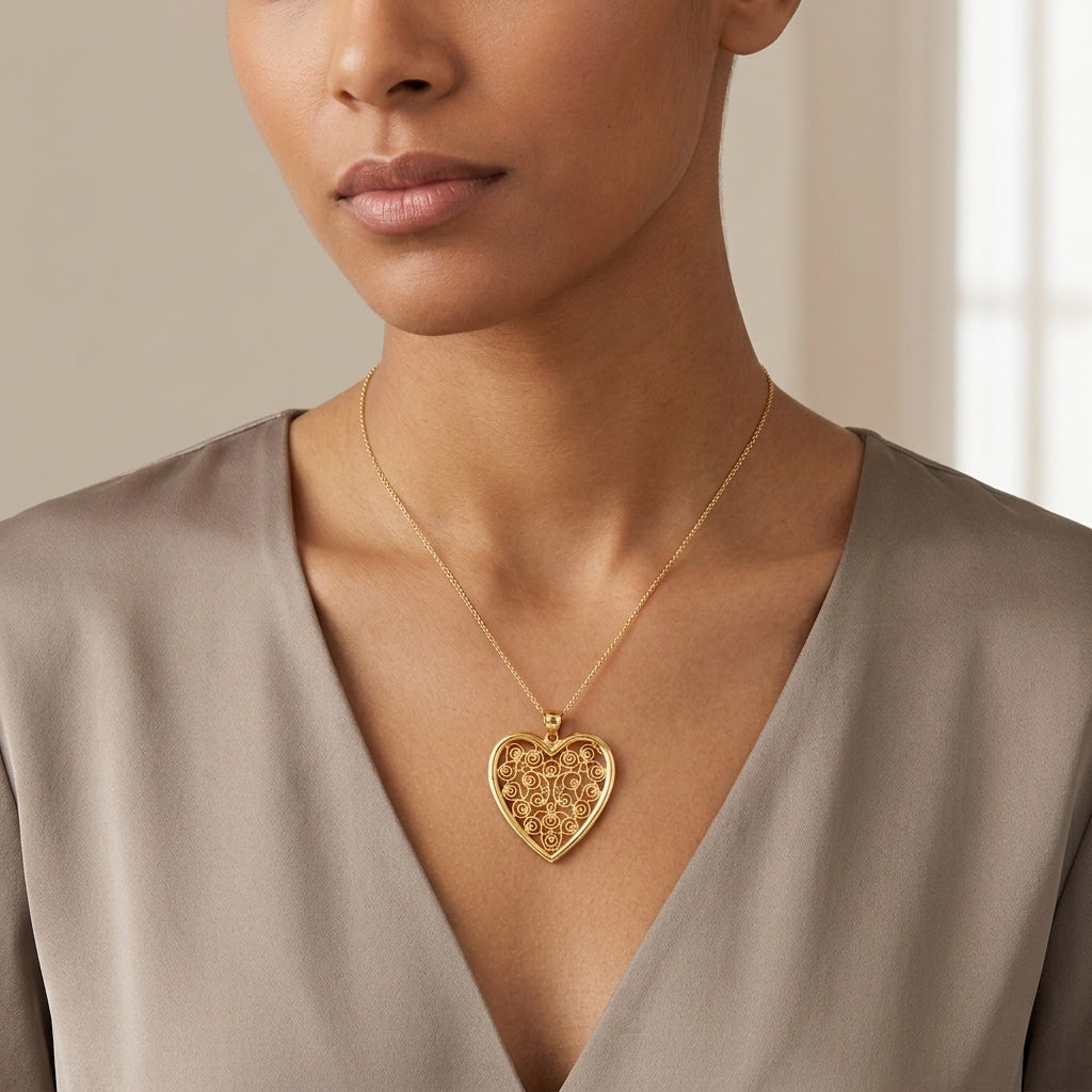 14K Yellow Gold Open Heart Filigree Scrollwork Pendant model still
