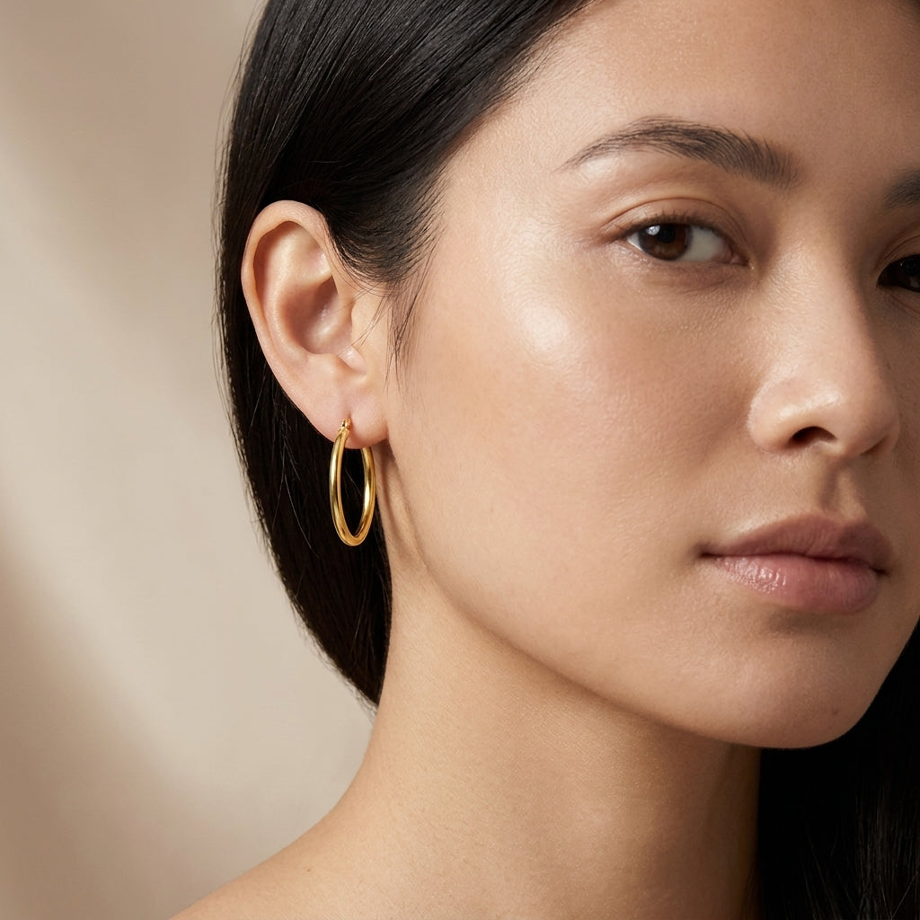 14K Yellow Gold Classic Slim Lightweight Hoop Earrings 19mm model still