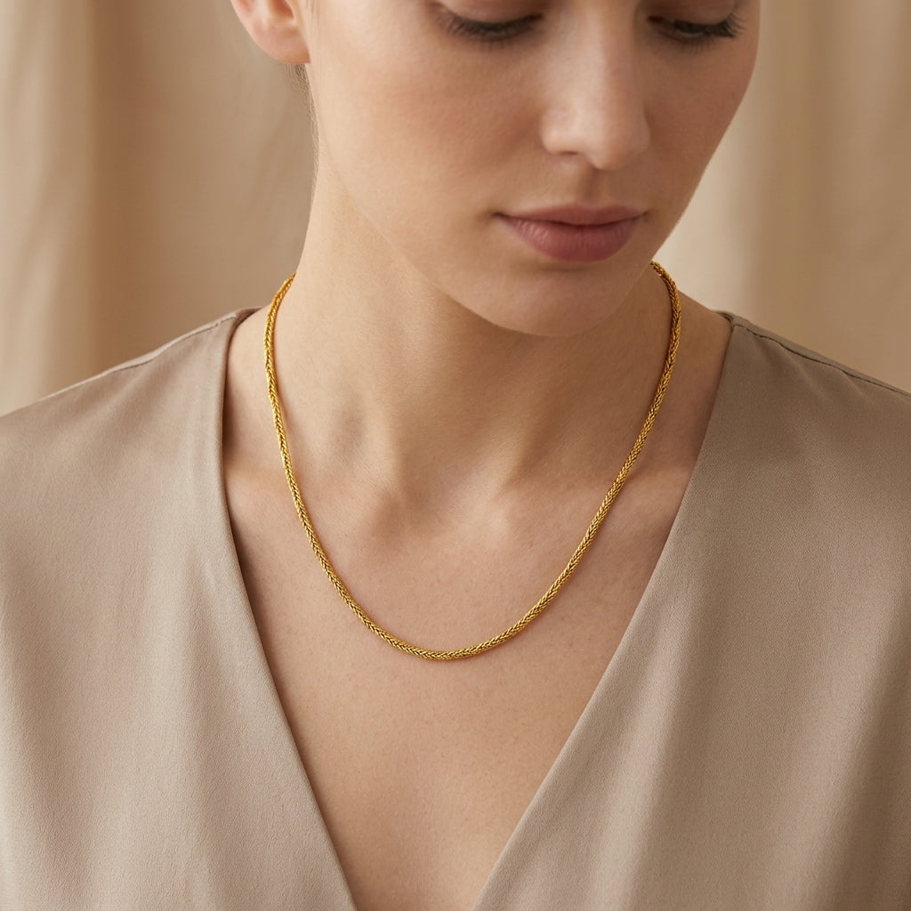 18K Gold Dainty Woven Wheat Twist Chain model still