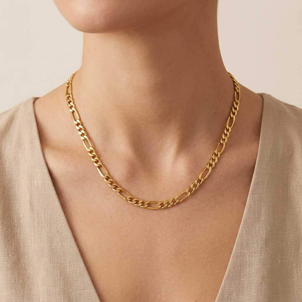14K Yellow Gold Classic Figaro Link Chain model still