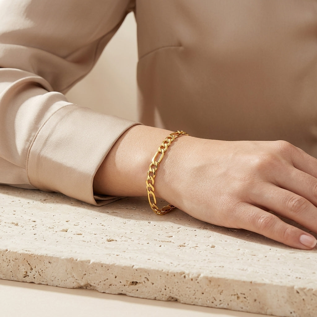 10K Gold Flat Figaro Link Bracelet model still